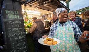 A picture of Nadeen from a Caribbean food business in Wellington Market.