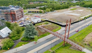 An aerial photo of the footbridge and wider Station Quarter project.