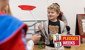 Young boy smiling and playing