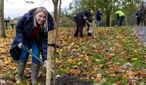 Councillor Carolyn Healy, (Lab) Telford & Wrekin Council’s Cabinet Member for Neighbourhoods, Planning and Sustainability, planting a tree in Telford Town Park.