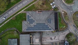 An aerial photograph showing solar panels on the roof of Randlay Community Centre