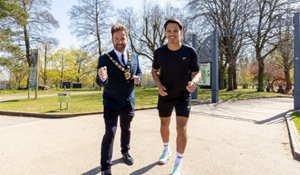 Councillor Ian Preece, Mayor of the Borough of Telford and Wrekin, with Brandon Tanomjit, in Telford Town Park, as he prepares for his penultimate charity marathon.
