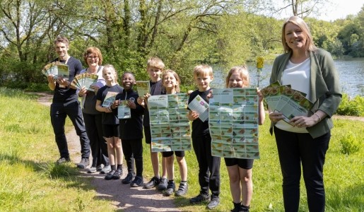 Councillor Carolyn Healy, far right, with Rick Shaw from Telford & Wrekin Council and Helen Watson, assistant headteacher at Holmer Lake Primary and pupils with the new butterfly and moth guide.