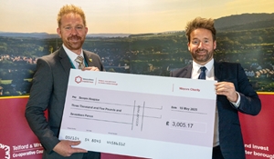 Cllr Ian Preece, Mayor of Telford and Wrekin for 2024/25 presenting a fundraising cheque to Phil Haigh from Severn Hospice