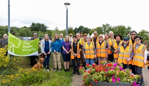 Councillor Carolyn Healy, Telford & Wrekin Council Cabinet Member for Neighbourhoods, Planning and Sustainability, is joined by Council staff and volunteers for the flag raising in Telford Town Park.
