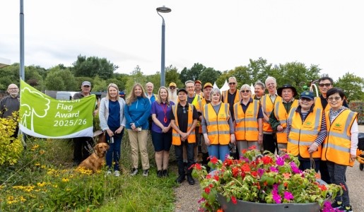 Councillor Carolyn Healy, Telford & Wrekin Council Cabinet Member for Neighbourhoods, Planning and Sustainability, is joined by Council staff and volunteers for the flag raising in Telford Town Park.