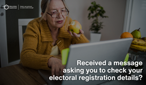 A person looking at their laptop. Caption reads Received a message asking you to check your electoral registration details?