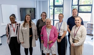 Group of people in the new SEND hub at Millbrook Primary School