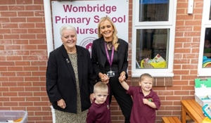 Councillor Shirley Reynolds with Eileen Solomon, headteacher at Wombridge Primary School with nursery children