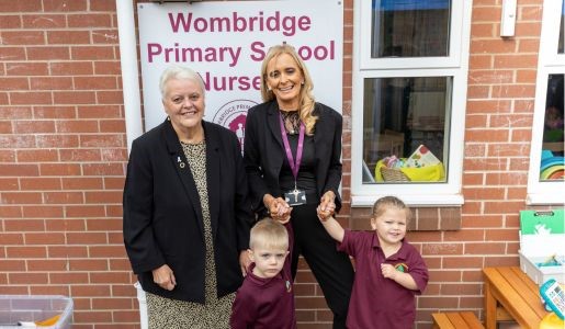Councillor Shirley Reynolds with Eileen Solomon, headteacher at Wombridge Primary School with nursery children