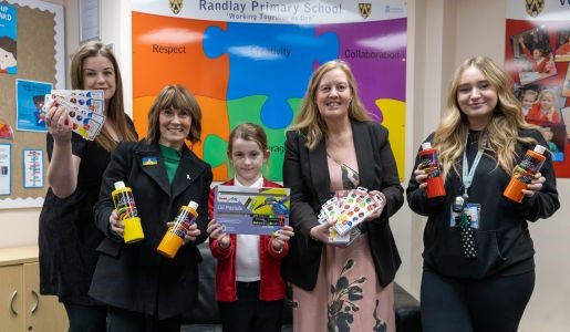 Flag competition winner Amelia (centre) with from to right: Jayne, Amelia's Mum, Councillor Angela McClements, Lynda Stolic, Headteacher and Sam Stevens, class teacher