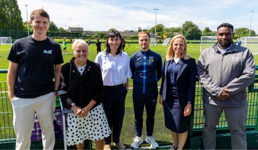 A group photo at the official opening of 3G football pitch at Burton Borough School