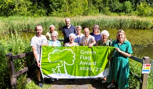 Cllr Carolyn Healy and the Friends of Ketley Paddock Mound celebrate being awarded Green Flag status