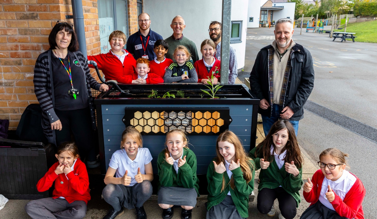 Pupils get hands-on with nature as flood-busting planters take root at Lightmoor Village Primary School